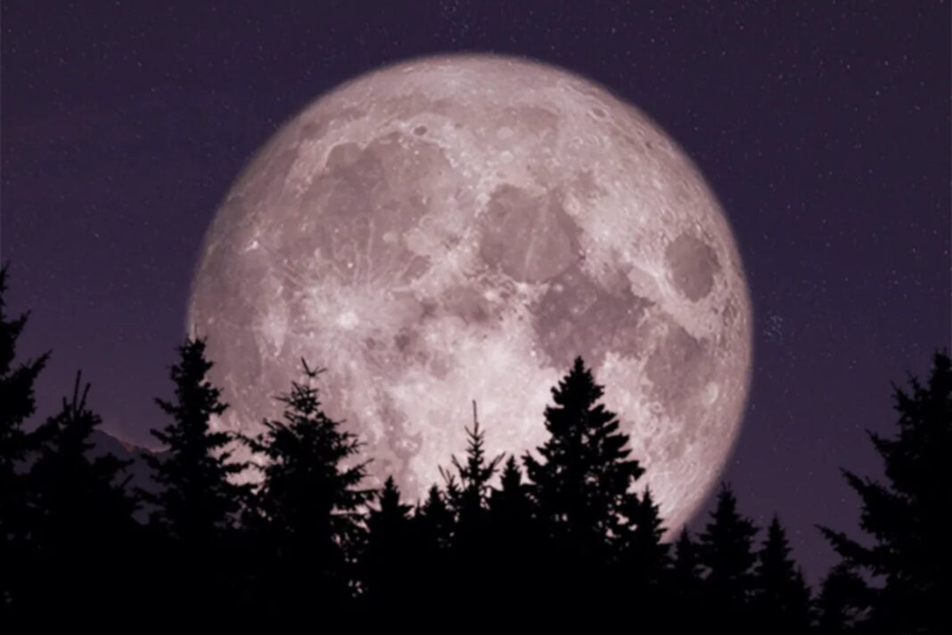 Ilustración de una luna llena en el cielo nocturno, representando el fenómeno de la luna azul.