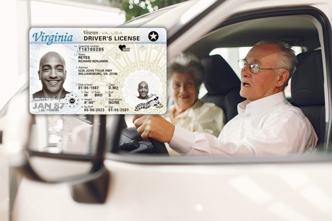 Persona sosteniendo una Driver Privilege Card de Virginia junto a un volante de auto